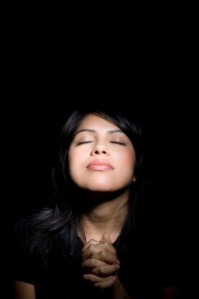 young woman with eyes closed in peace